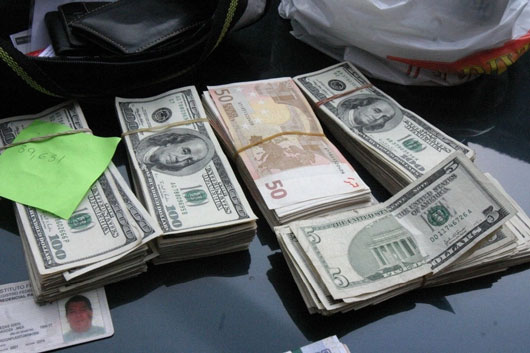 Reino Unido y EU desarticulan red mundial de lavado de dinero